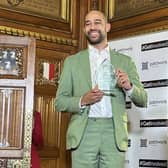 Josh Babarinde with the 'New MP of the Year' award. Photo: contributed