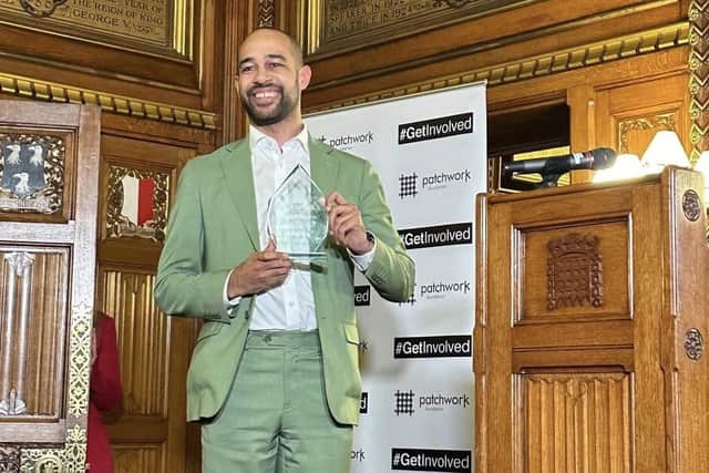 Josh Babarinde with the 'New MP of the Year' award. Photo: contributed