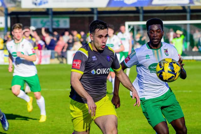Nathan Odokonyero chases possession but the Rocks lost to Canvey Island | Picture: Tommy McMillan