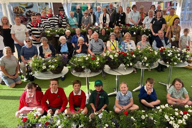 Some 33 groups and individuals provided hanging baskets for the Queen's Platinum Jubilee at The Orchards in Haywards Heath