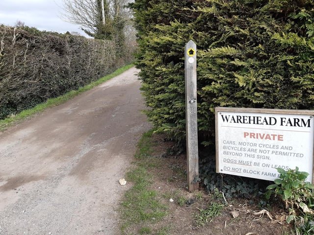 Cross the road to the small car park opposite, where you will see a second Windmill Trail noticeboard, then take the footpath on the right at Warehead Farm.