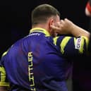 Two-time world champion Luke Littler endured a difficult night in Brighton, as he was booed by sections of the crowd and knocked out in the quarter-finals by Stephen Bunting. Photo: Taylor Lanning/PDC