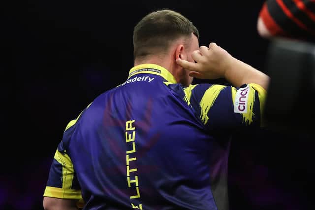 Two-time world champion Luke Littler endured a difficult night in Brighton, as he was booed by sections of the crowd and knocked out in the quarter-finals by Stephen Bunting. Photo: Taylor Lanning/PDC