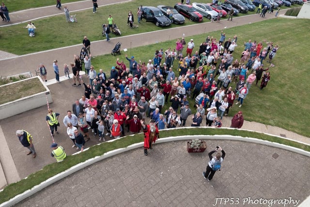 The Platinum Jubilee weekend: People getting ready for an aerial photograph to be taken on the lawns adjacent to the De La Warr Pavilion. Photo by Jeff Penfold.