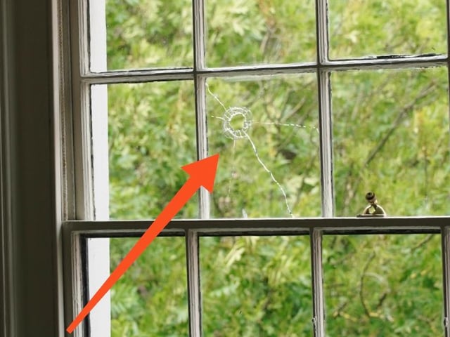 Hole caused by the missile (marked)