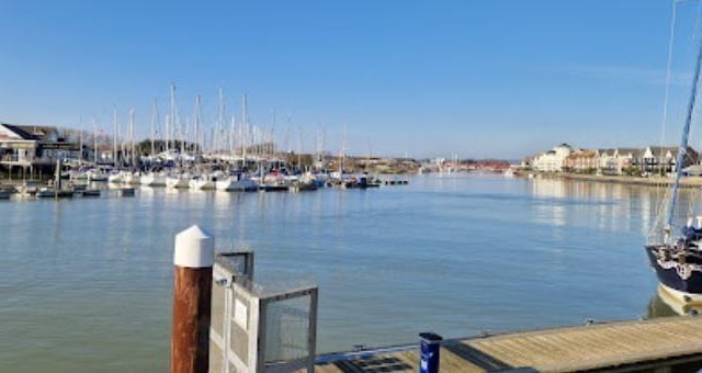 A small town in West Sussex offering affordable housing and a range of amenities, including a high street with shops and restaurants, a leisure centre, and a train station