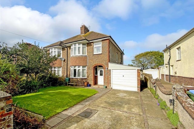 The three-bedroom, semi-detached house with feature gardens has just come on the market with Glyn Jones priced at £420,000. The agents say this 1930s-built family home has been sympathetically updated and improved.