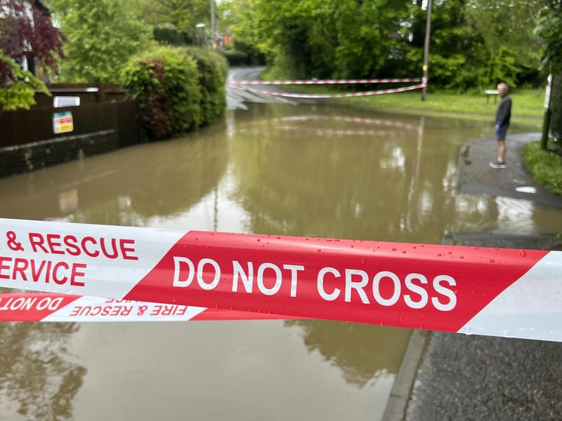 In Pictures: West Sussex road closed following heavy flooding