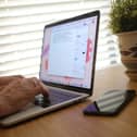 Katherine is grateful for being able to work from home. (Photo by CHRIS DELMAS/AFP via Getty Images)