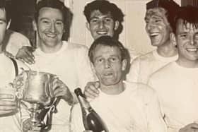 Eddie Woods - centre - celebrating a trophy win with his team-mates  | Picture via EUFC
