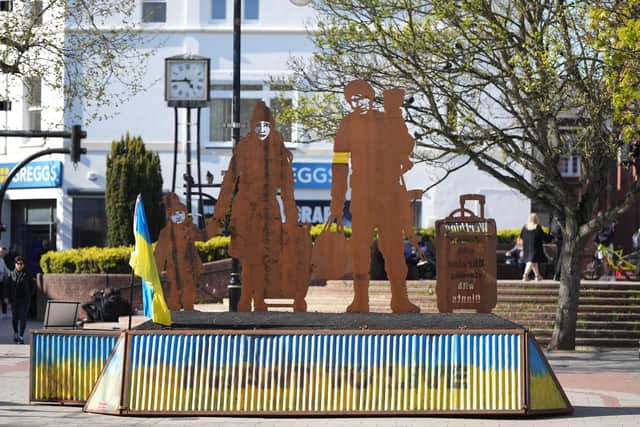 The eye-catching commemorative sculpture –  of a Ukrainian soldier holding a baby while leading a mother and another child to safety – was installed in Worthing town centre on Wednesday, May 3.  Photo: Eddie Mitchell