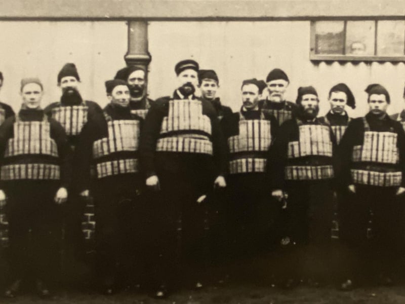 Crew of the ‘Michael Henry III’, circa 1897. The bearded man in the centre is Coxswain Winter. The young boy looking over his shoulder is Richard Payne. When Second Coxswain S. Winter retired from the service in 1954 a family record of 100 years association with Newhaven lifeboats was interrupted. From 1854-1954 there was always a Winter in the crew.