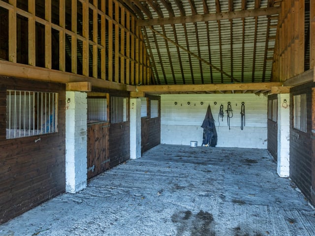 The small barnhas been converted into a stable block with space for up to six horses