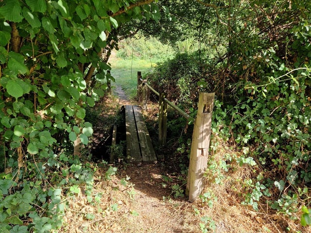There is a small wooden bridge to negotiate