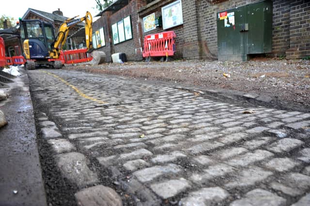Roadworks just down from Burgess Hill railway station have exposed some old brickwork. SR2210185