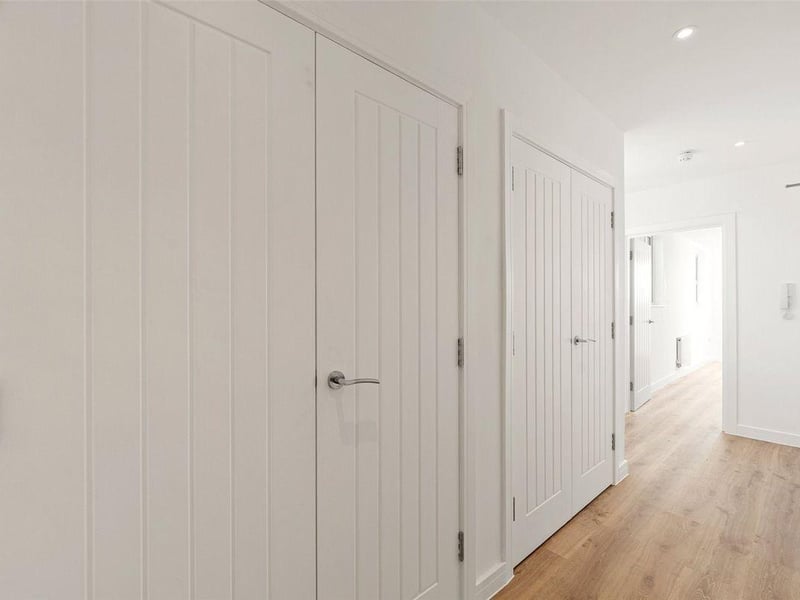 The penthouse, on the third floor, has three double bedrooms, a modern kitchen and bathroom, and south-facing terrace with views of the town and beyond