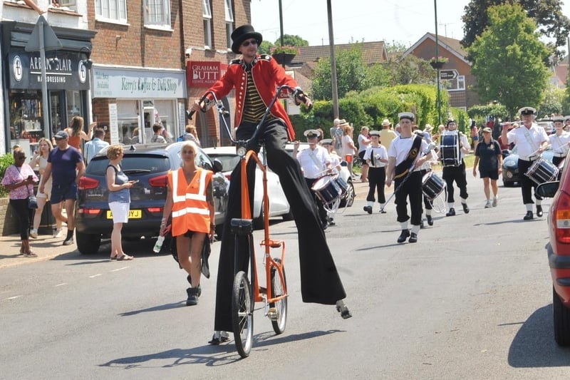 The floats and walking groups proceeded through the village in colourful and imaginative costumes with crowds of spectators lining the streets to cheer them on