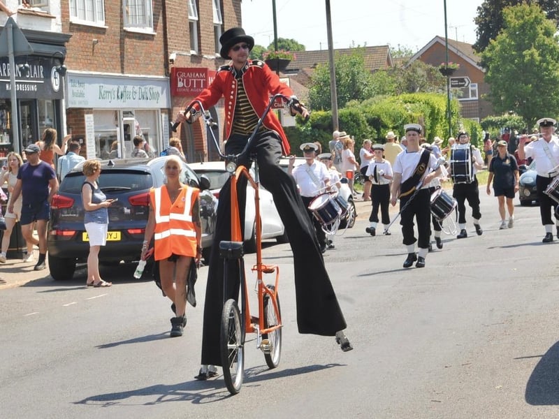 The floats and walking groups proceeded through the village in colourful and imaginative costumes with crowds of spectators lining the streets to cheer them on