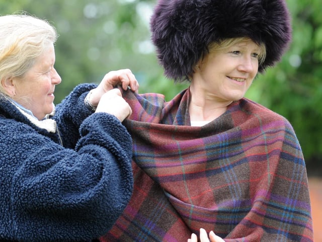 Kate Steed wraps Sally Banting in one of her lambswool wraps and hat