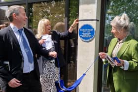 Duncan Crow, cabinet member for libraries at West Sussex County Council, and Worthing mayor Cathy Glynn-Davies with Susan Belton, chair of The Worthing Society, unveiling the Blue Plaque