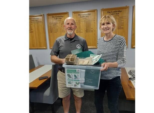 Ray Cruttenden and Jules Woodward with the tree-planting kit