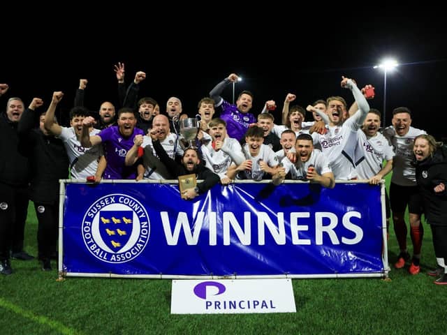 Horsham YMCA lift the Sussex Principal RUR Charity Cup.