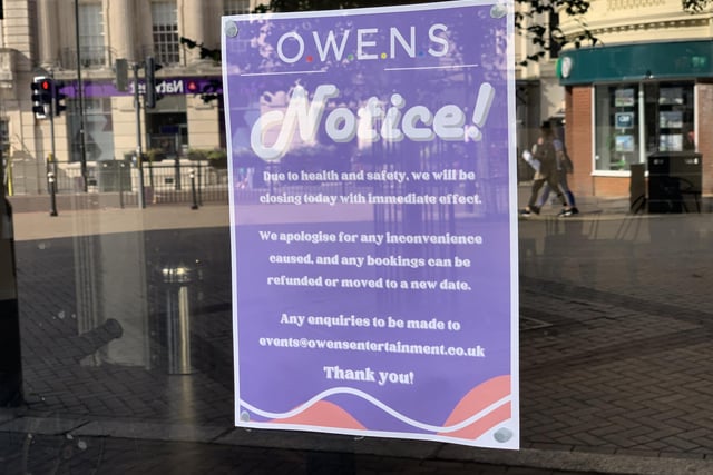The sign on Owens' window, which went up in early September. Photo: Staff
