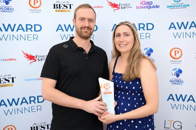 Lee Stace & Caroline Stace collect the award for Amberley Village Stores & Post Office. (Photo contributed)