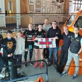 Emma Kirwin with the crew at Shoreham Harbour Lifeboat Station