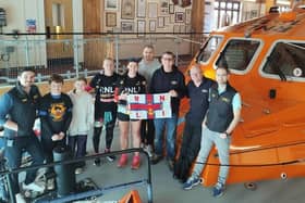 Emma Kirwin with the crew at Shoreham Harbour Lifeboat Station