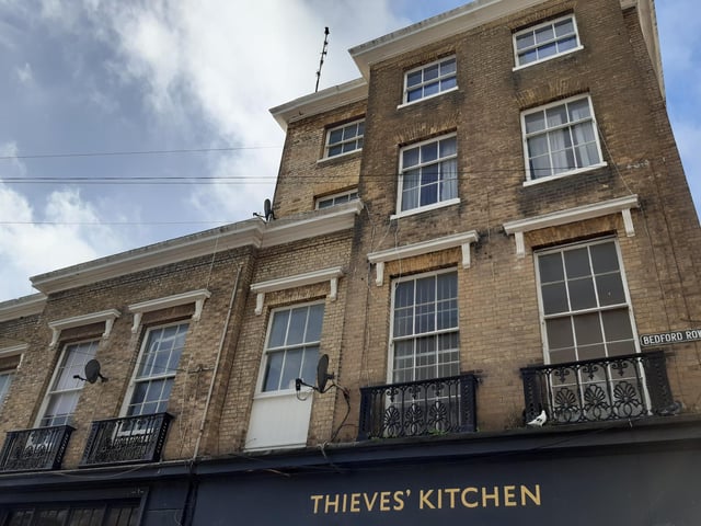 It's been many names but most will always think of it as The Thieves Kitchen. This side of it actually used to be a bank and then a department store.