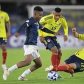 Ecuador's Oscar Zambrano (L) his expected to complete a move to the Premier League