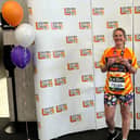 Martine receives her London Marathon 2024 medal.