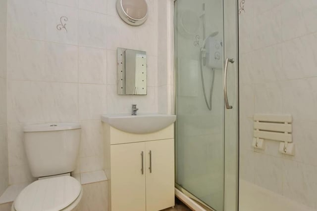 The apartment has a modern shower room.