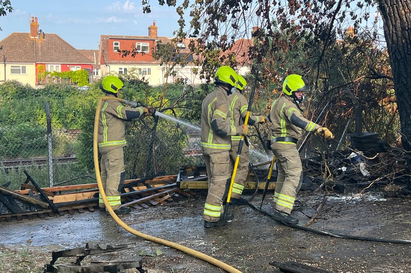 Firefighters by the blaze in Hazelwood Avenue, Eastbourne