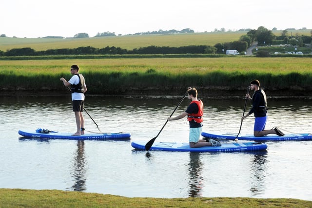 There are so many beautiful places across Sussex which are perfect for water sports, whether that is paddle boarding (pictured here at Cuckmere Haven), sailing, kayaking, and the like.