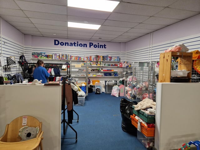 Inside Guild Care's new shop dedicated to children's toys, clothes and equipment, as influencer Jen Graham, known as Charity Shop Girl cuts the ribbon to officially open the Portland Road store