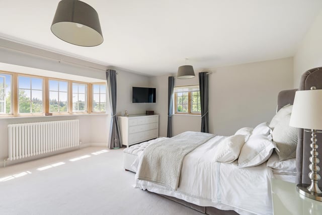 The first floor offers five good-size double bedrooms