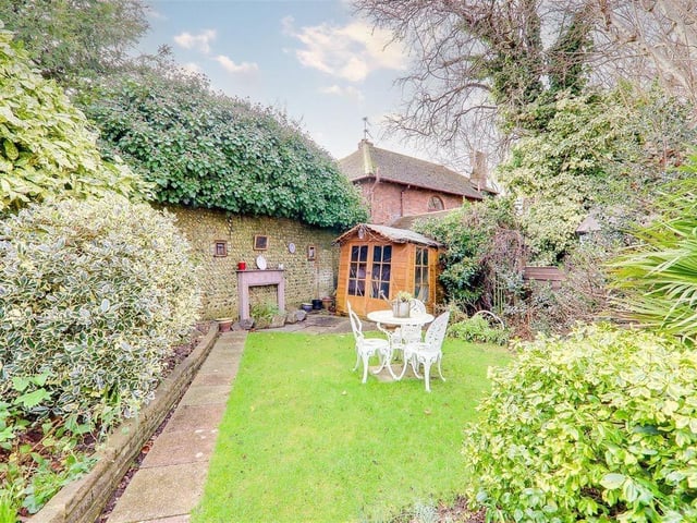 This three-bedroom detached house with feature garden has come on the market with Bacon and Company with a guide price of £725,000