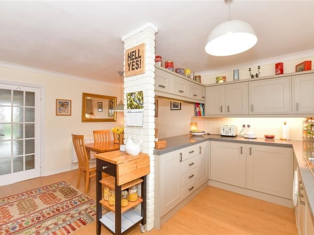 This modern town house with waterside garden is tucked away on a desirable private development in the heart of Arundel. It comes to the market with Cubitt & West, priced at £700,000.