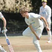 Alex Stephens bowls for Findon v Rustington - he took four wickets to set up his side's win | Stephen Goodger