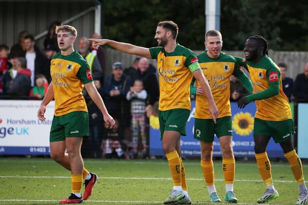 Horsham FC take on - and beat - Dorking Wanderers in the FA Cup, watched by a huge crowd at the Camping World Community Stadium