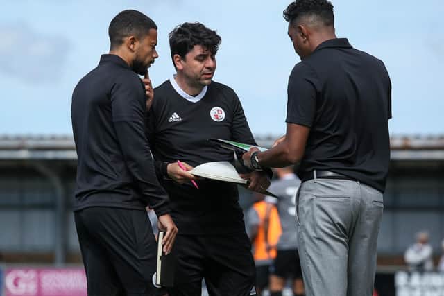 Dan Micciche discusses tactics with
