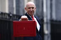 On Wednesday October 28, John Healey presented his first budget announcing £100 energy payment scheme |Photo by Henry NICHOLLS / AFP via Getty Images)