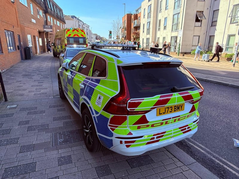 Police joined the emergency response after a car collided directly into the front of a barbershop.