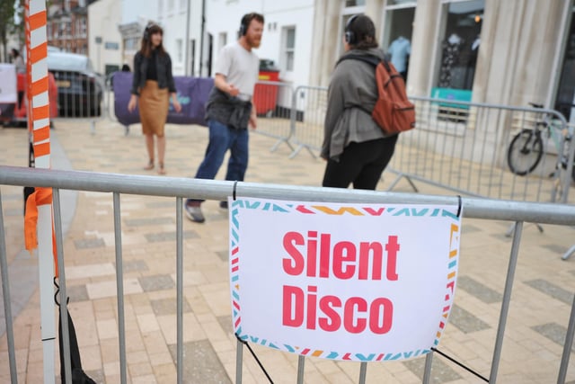 Dancing to music on headphones at the silent disco