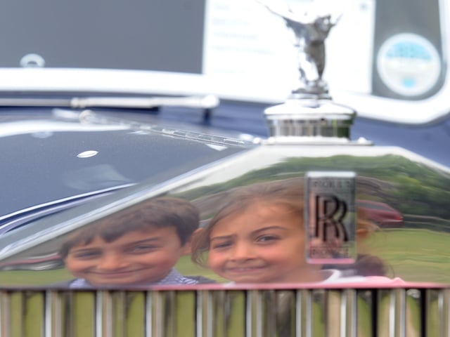 Visitors enjoyed viewing the many vintage cars on show