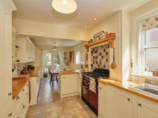 The dining room over looks and opens onto the rear garden, whilst the dual aspect 22' kitchen diner has matching wall and base cupboards, work surfaces, integrated appliances and French doors which also lead onto the rear garden.