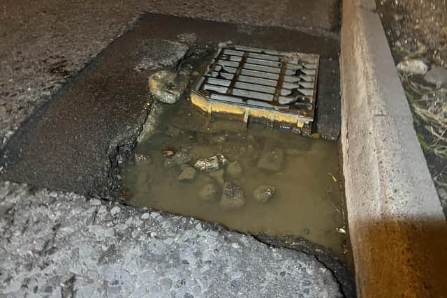 A large pothole was spotted next to a draincover on the A24 northbound, near the Findon roundabout, earlier this month. Photo: Eddie Mitchell
