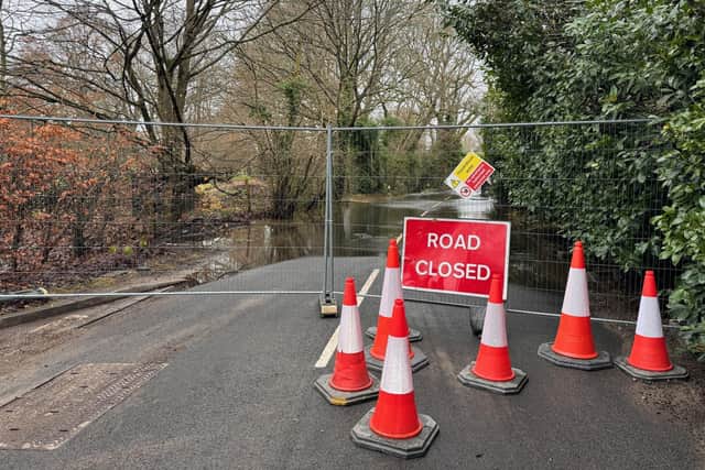 Drivers are being warned not to remove barriers or attempt to drive along a key South Downs road which has been shut since Friday following flooding. Photo contributed